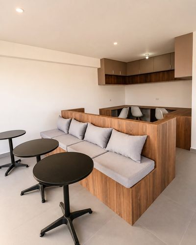 Suite Ejecutiva — Zona de coworking del edificio