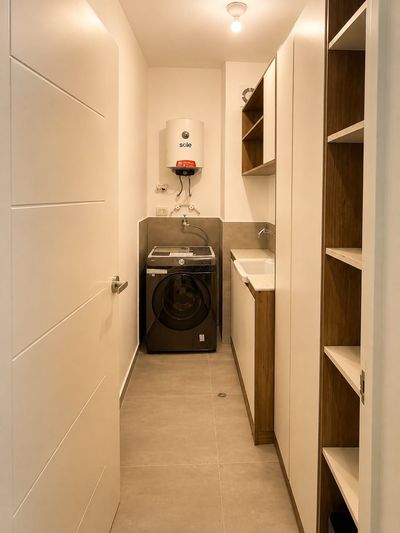 Suite Familiar 603 — Zona de lavandería